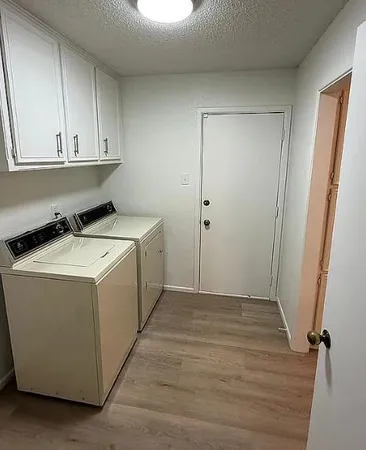a view of utility room with washer and dryer