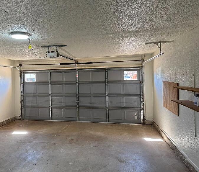 5232 95th Street Lubbock, TX 79424 - Photo 6 of 35 a view of an empty room with a cabinet