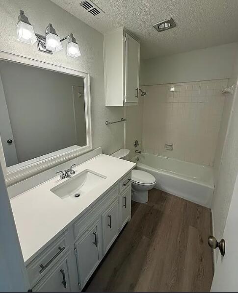 5232 95th Street Lubbock, TX 79424 - Photo 7 of 35 a bathroom with a double vanity sink mirror and toilet