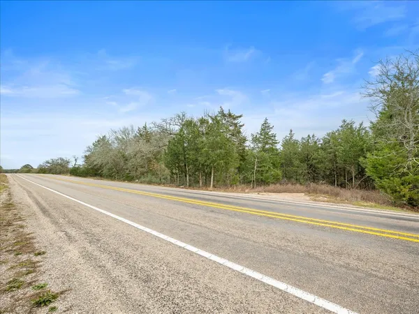 a view of a big and yard with green space
