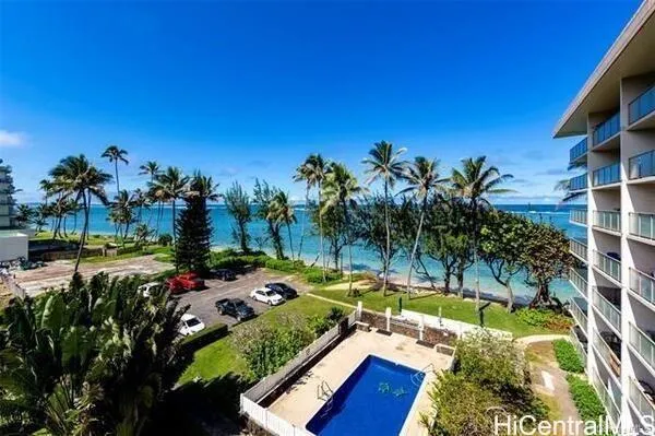 a view of swimming pool with a patio