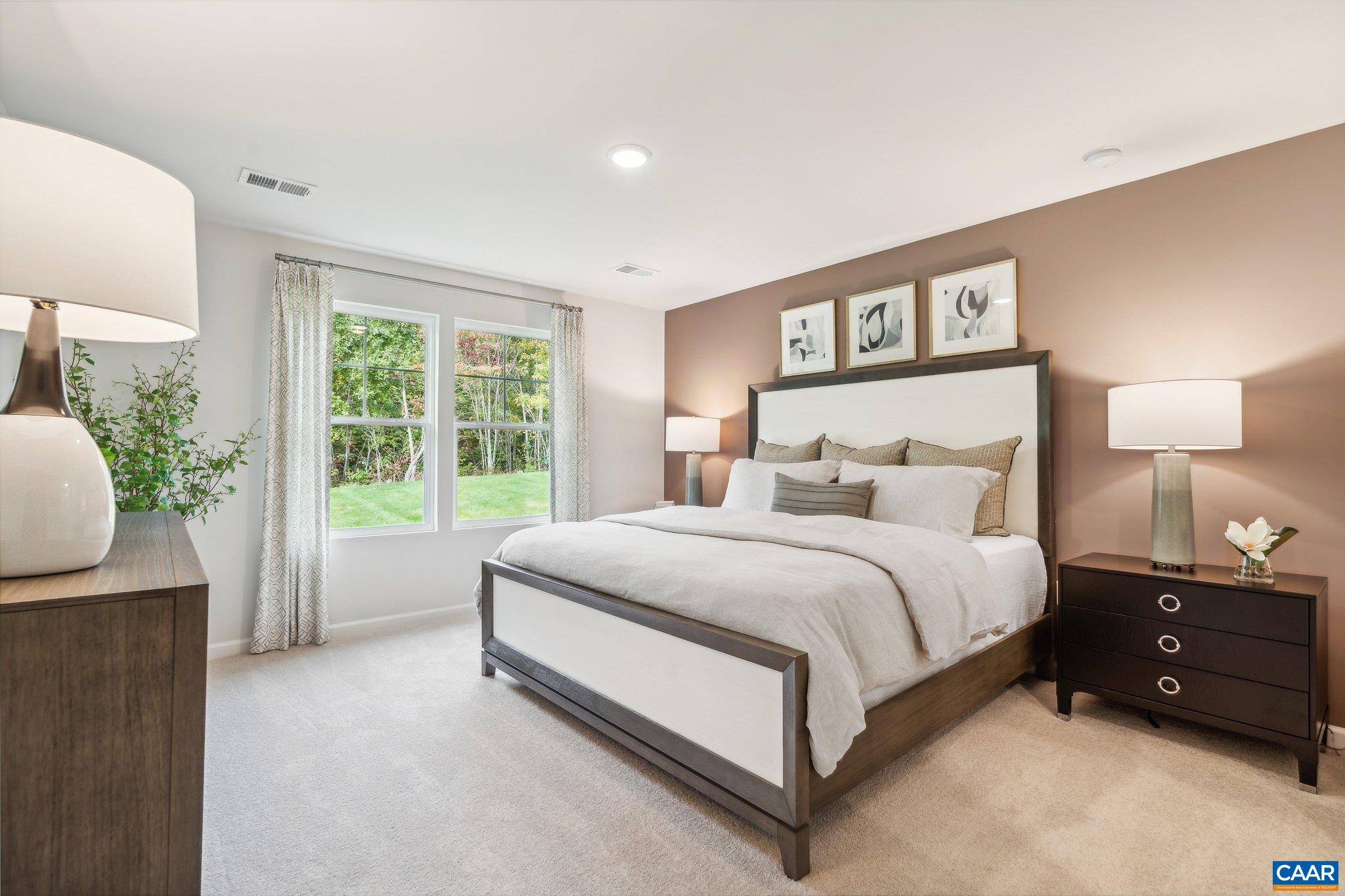 Tbd Tbd Trailfork Road, Unit LOT 98 Barboursville, VA 22923 - Photo 16 of 40 a spacious bedroom with a bed and a couch