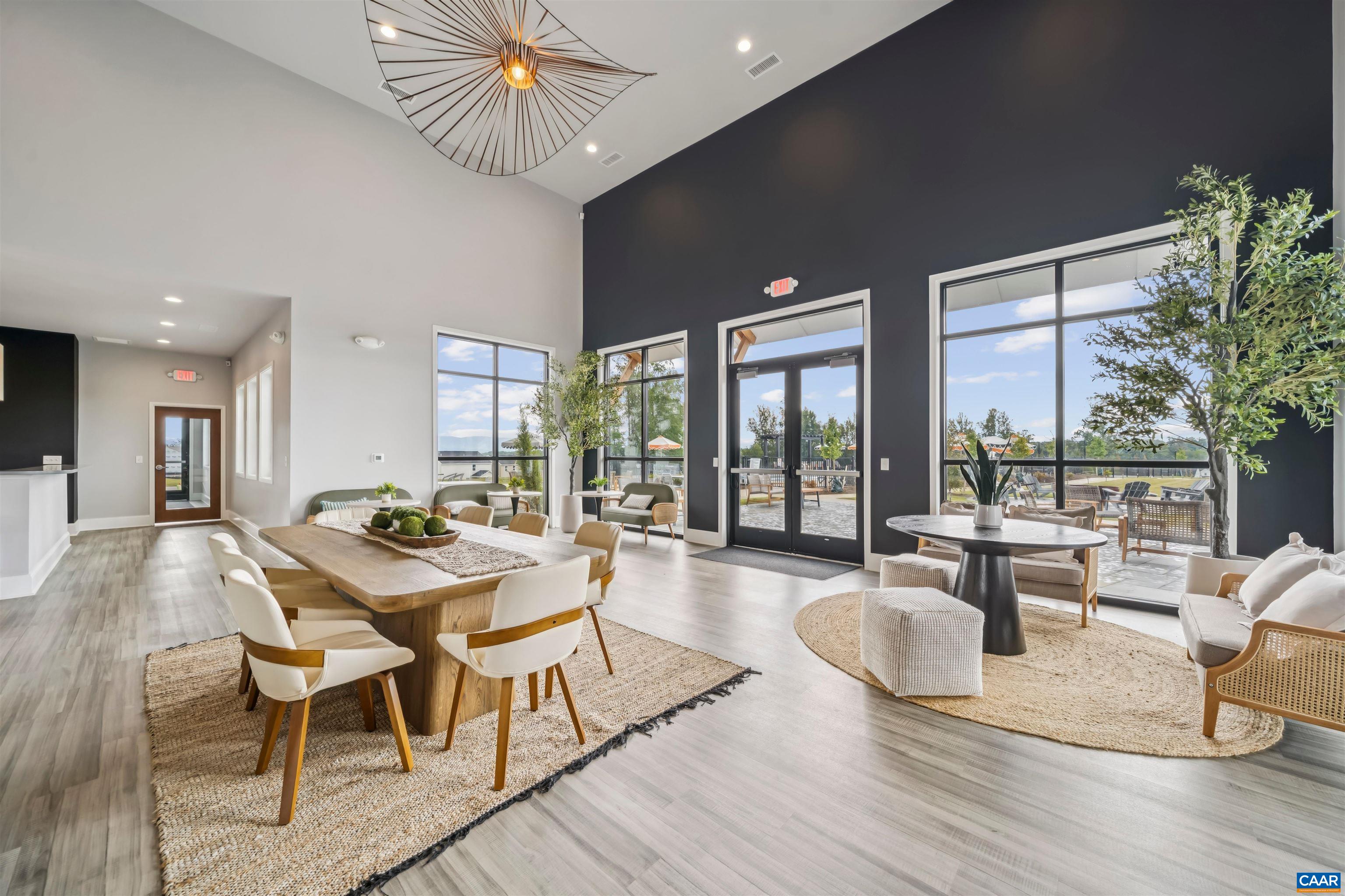 Tbd Tbd Trailfork Road, Unit LOT 98 Barboursville, VA 22923 - Photo 23 of 40 a view of a dining room with furniture wooden floor and chandelier