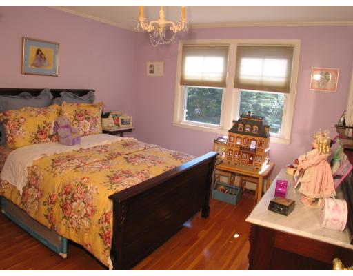 123 Johnson Road Winchester, MA 01890 - Photo 10 of 12 a bedroom with a bed and a window