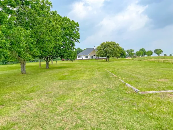 a big yard with lots of green space