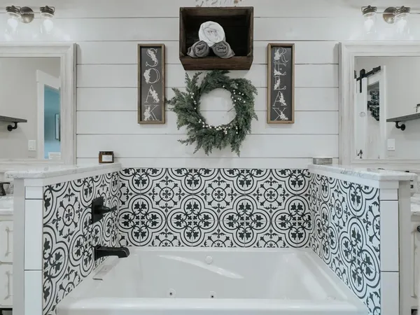 a bathroom with a bathtub and a sink