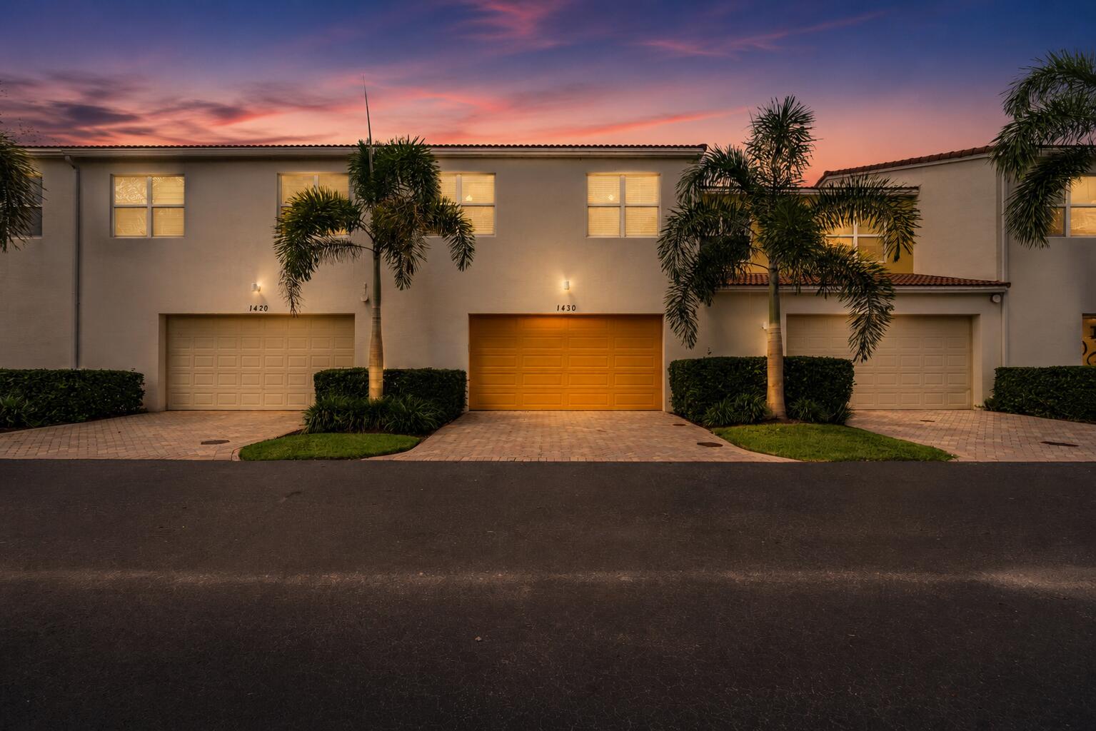 1430 Northwest 48th Lane Boca Raton, FL 33431 - Photo 54 of 54 a front view of a house with a yard and garage