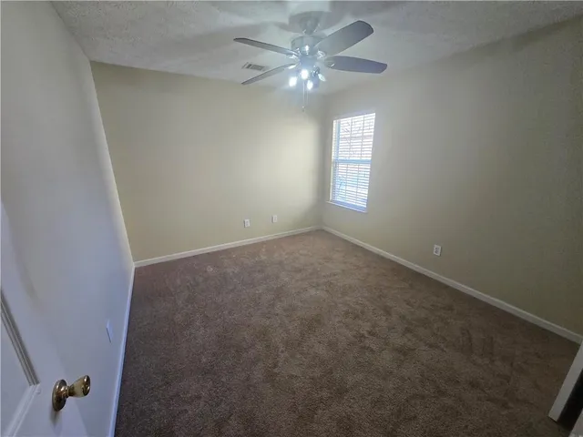 en empty room with windows