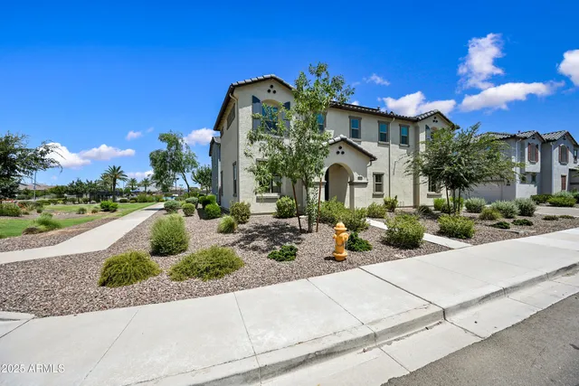 a view of a building with sitting area