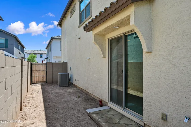 a bathroom with a double vanity sink toilet mirror and bathtub