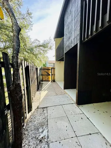 a view of balcony with wooden floor