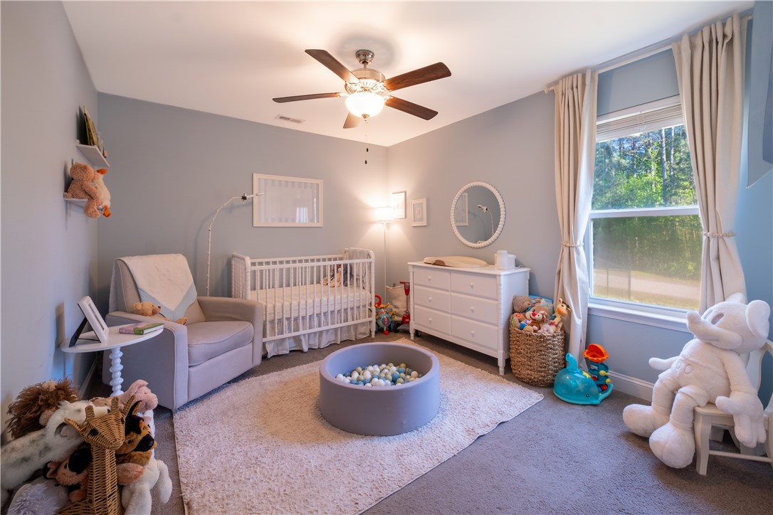 400 Green View Court Westminster, SC 29693 - Photo 12 of 23 This welcoming room offers comfort and light, ideal for quiet moments and play.
