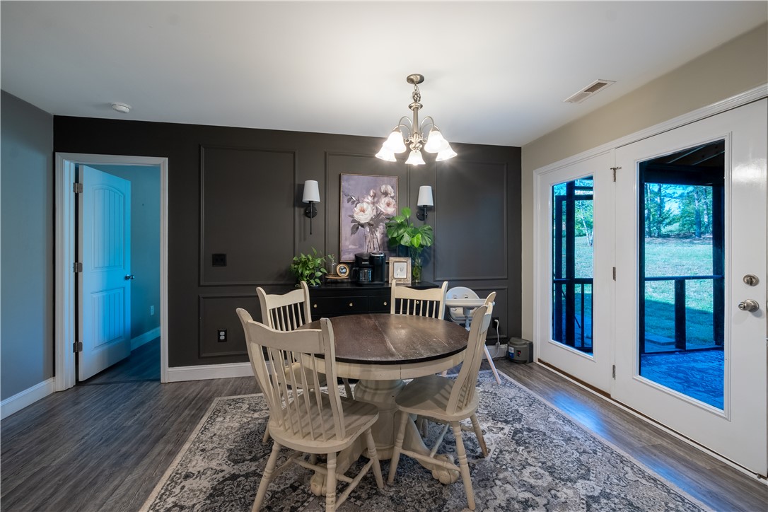 400 Green View Court Westminster, SC 29693 - Photo 13 of 23 This inviting dining area features elegant wainscoting and convenient patio access.