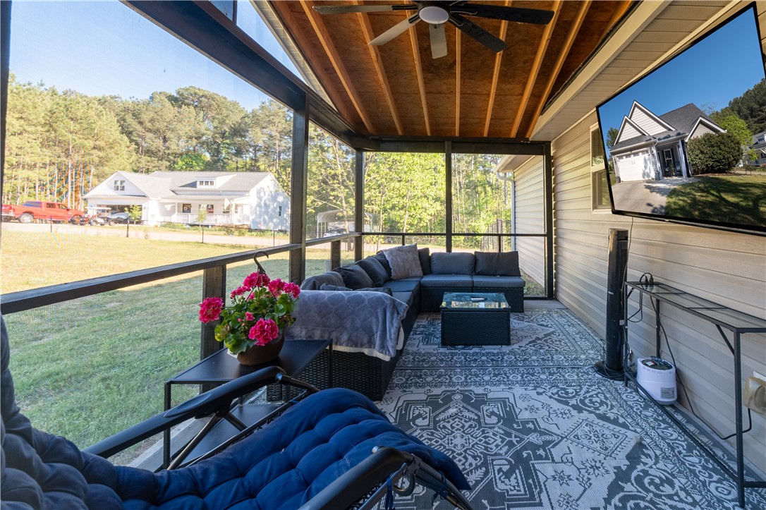 400 Green View Court Westminster, SC 29693 - Photo 20 of 23 Relax and unwind on this spacious screened porch, offering serene views of the surrounding greenery.