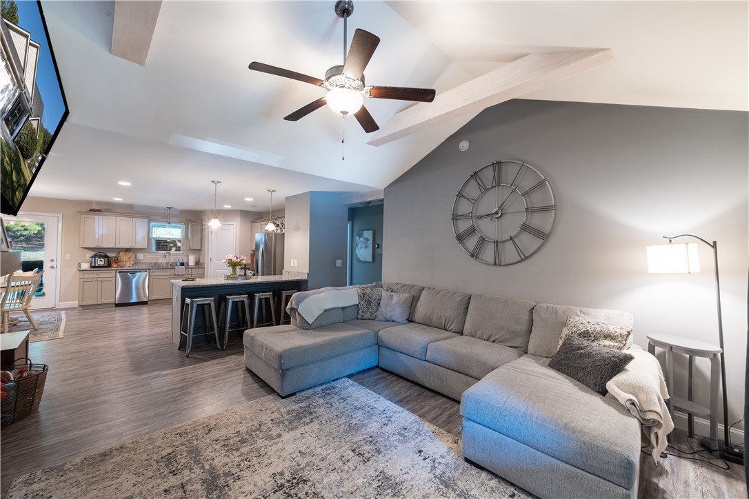 400 Green View Court Westminster, SC 29693 - Photo 5 of 23 This inviting space combines a cozy living area with an open-concept kitchen.