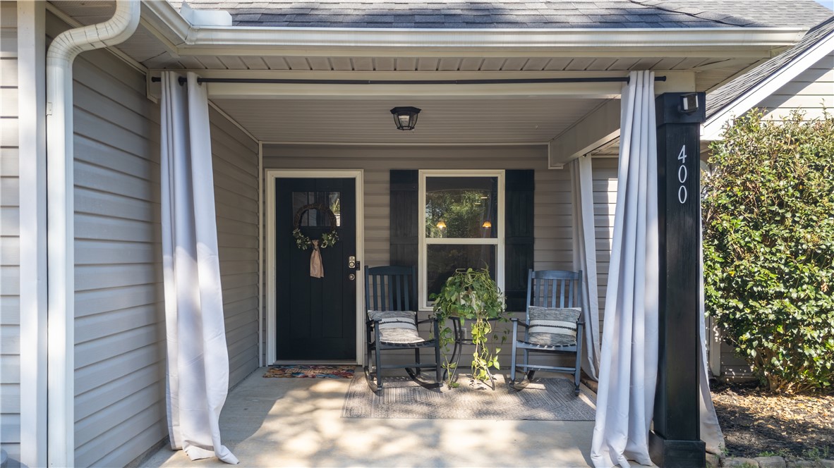 400 Green View Court Westminster, SC 29693 - Photo 9 of 23 This inviting porch offers a warm welcome with its classic design and comfortable seating.
