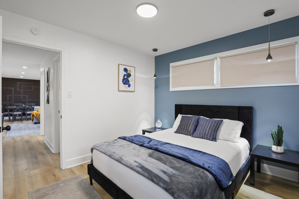 7125 Simpson Street Morton Grove, IL 60053 - Photo 17 of 33 a bedroom with bed and a window