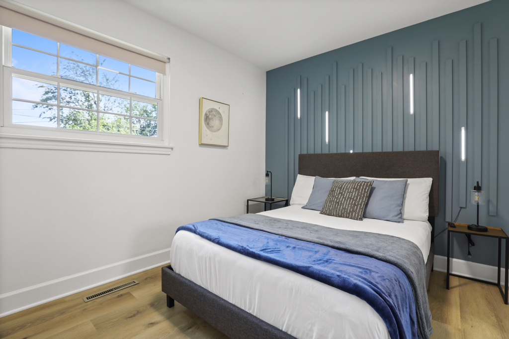 7125 Simpson Street Morton Grove, IL 60053 - Photo 19 of 33 a bedroom with a bed and a window