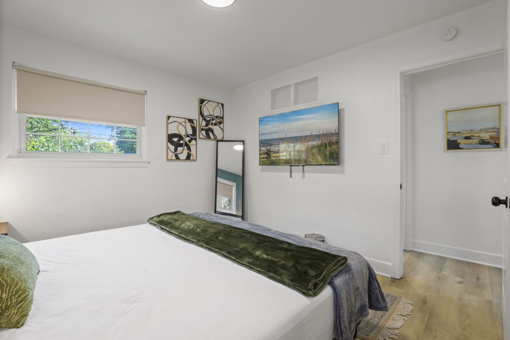 7125 Simpson Street Morton Grove, IL 60053 - Photo 25 of 33 a bedroom with a bed and a window