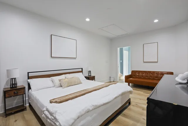 a living room with furniture and a gate