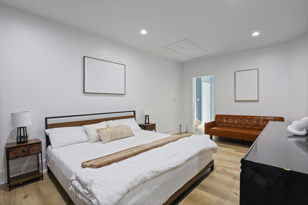 7125 Simpson Street Morton Grove, IL 60053 - Photo 29 of 33 a bedroom with a bed and a lamp