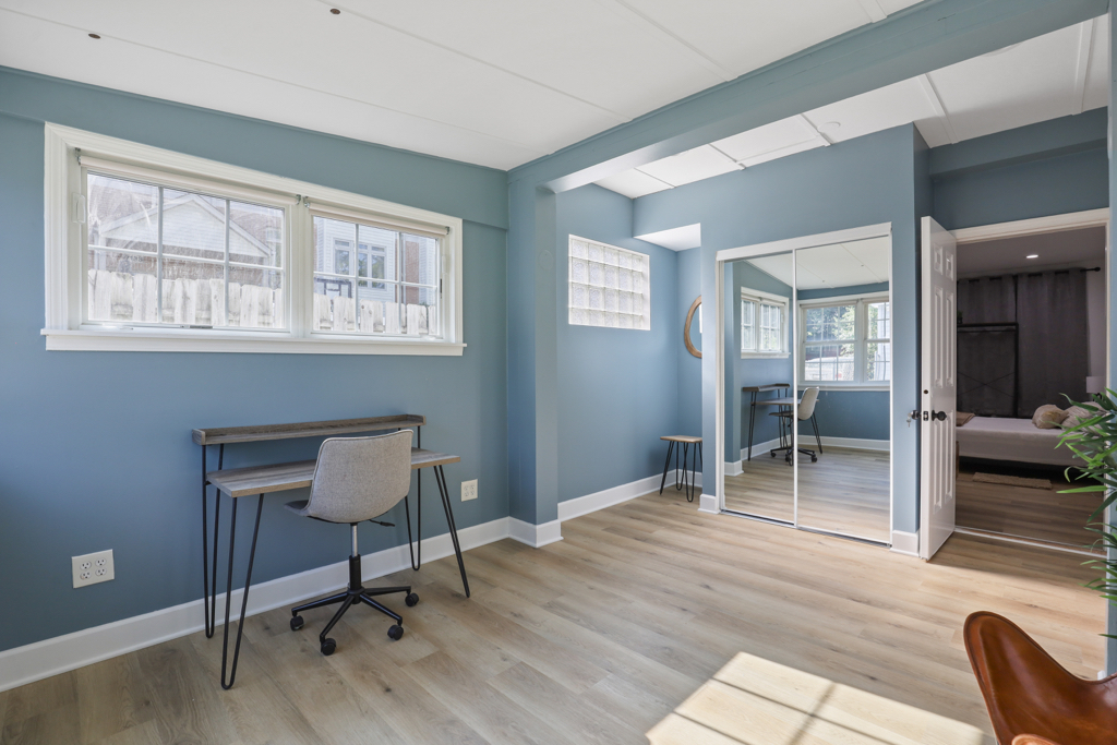 7125 Simpson Street Morton Grove, IL 60053 - Photo 30 of 33 a room with furniture and a window