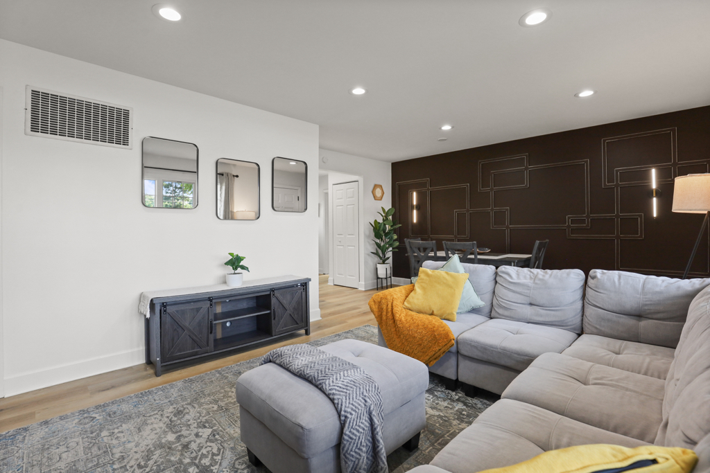 7125 Simpson Street Morton Grove, IL 60053 - Photo 6 of 33 a living room with furniture and a couch