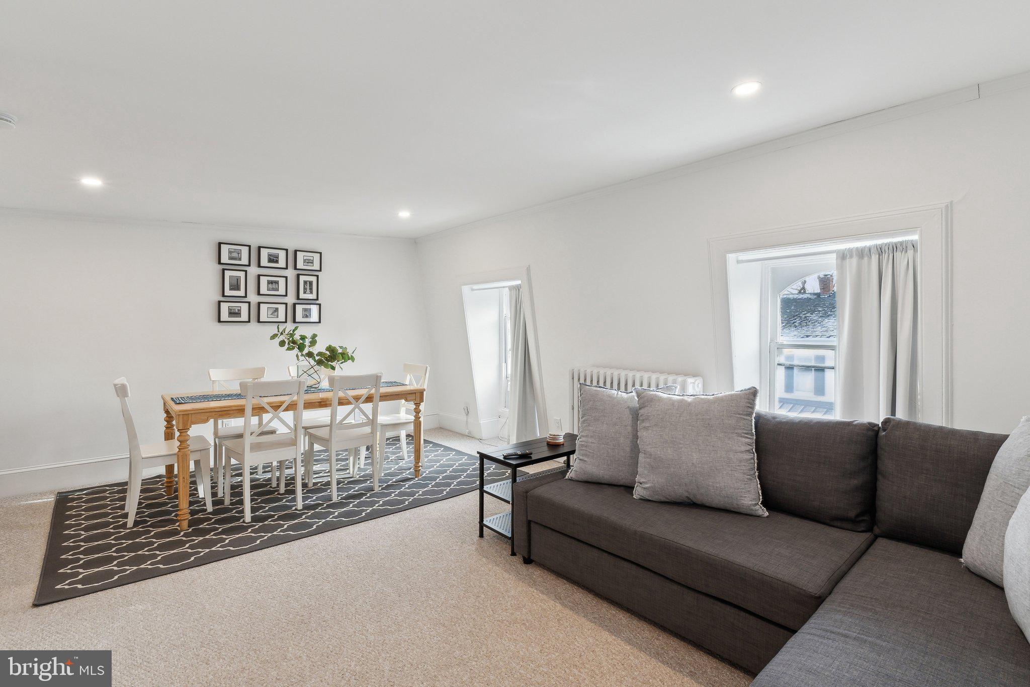 107 Conduit Street Annapolis, MD 21401 - Photo 35 of 57 Unit 4 huge sectional w/ pull out bed