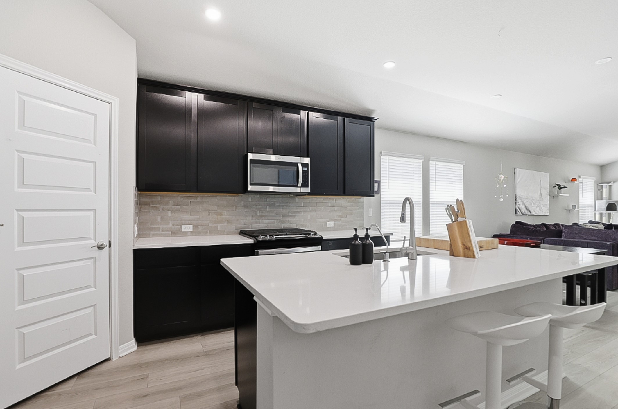 12206 Purple Prairie Lane Buda, TX 78610 - Photo 3 of 24 The kitchen is the heart of the home, and this one truly shines.