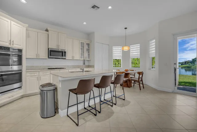 a bathroom with a sink toilet and vanity