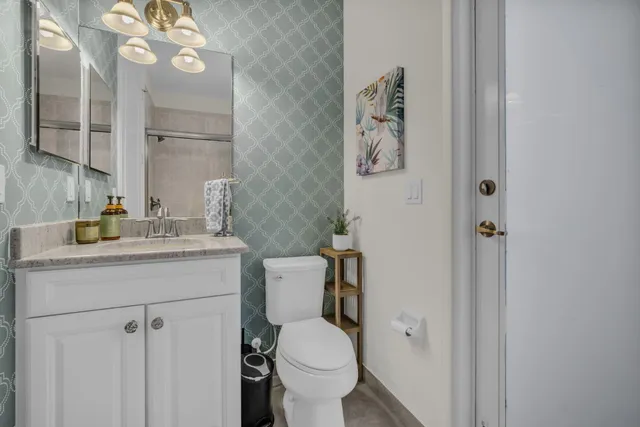 a view of a balcony with plants