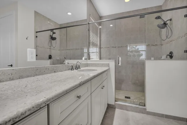 a view of a patio with couches chairs and a yard