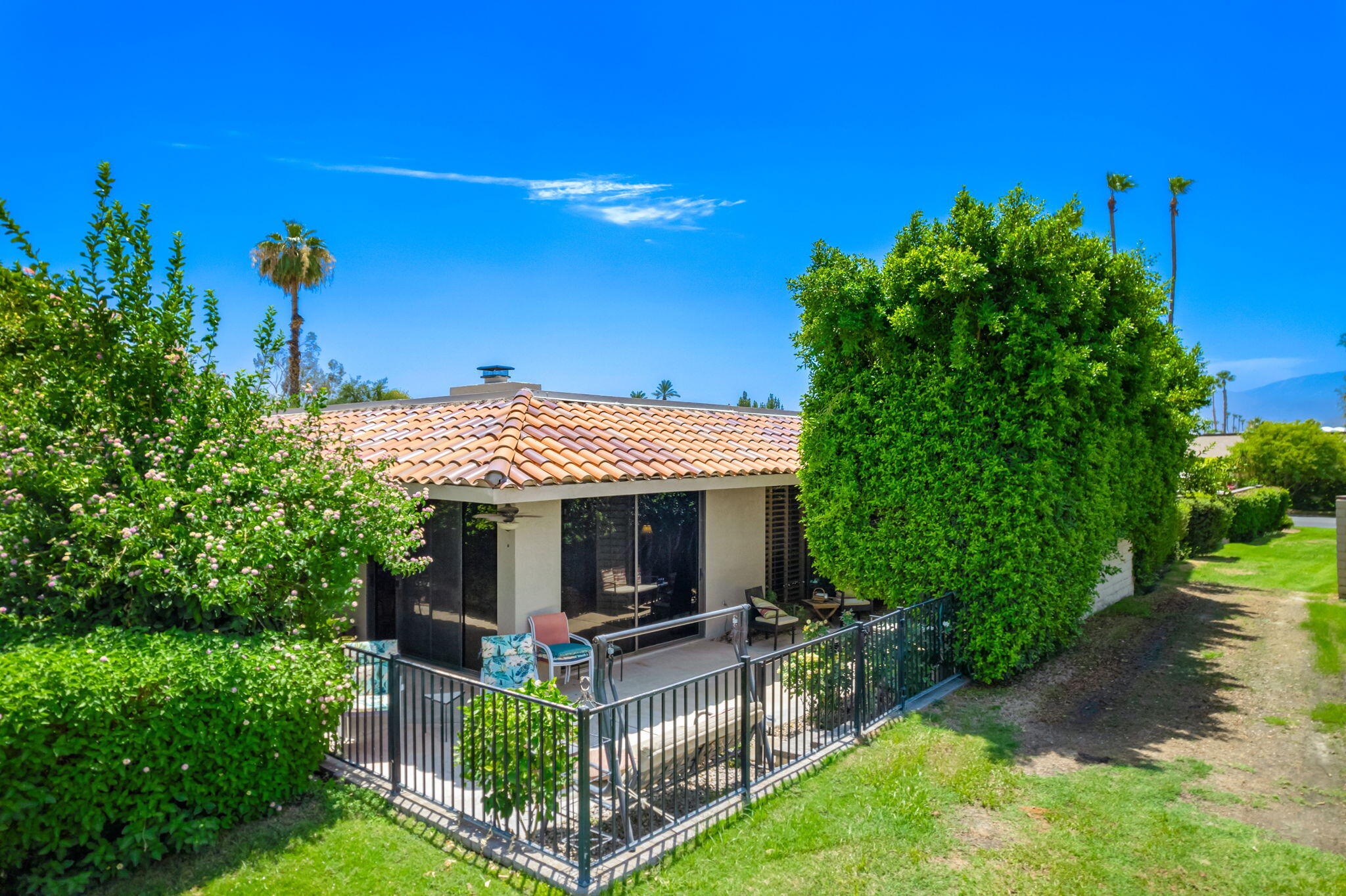 30 Colgate Drive Rancho Mirage, CA 92270 - Photo 29 of 40 Drone of corner of house