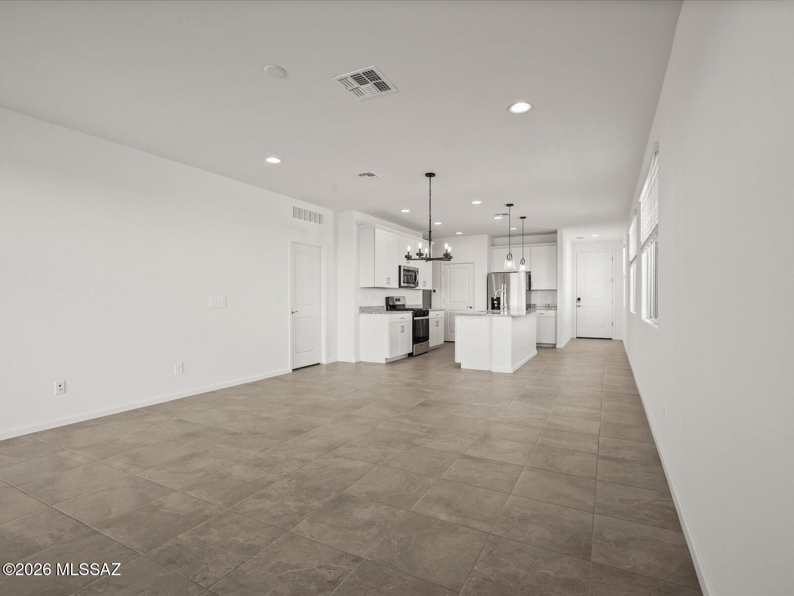 5180 West Bowen House Road Tucson, AZ 85757 - Photo 6 of 13 Photo is not of the actual home, but is an inspirational photo of builder’s model home and may depict options, furnishings, and/or decorator features that are not included