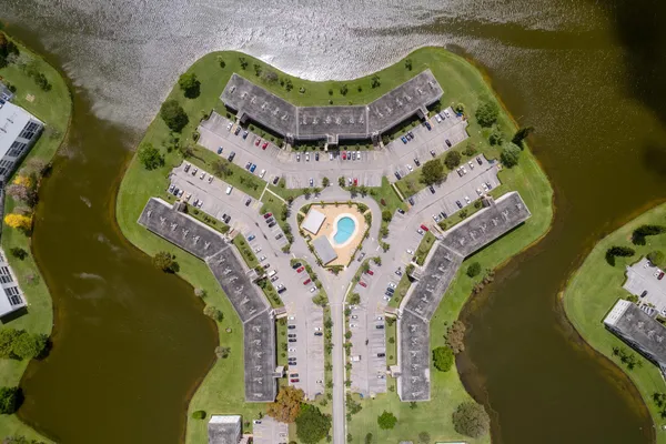 an aerial view of a swimming pool