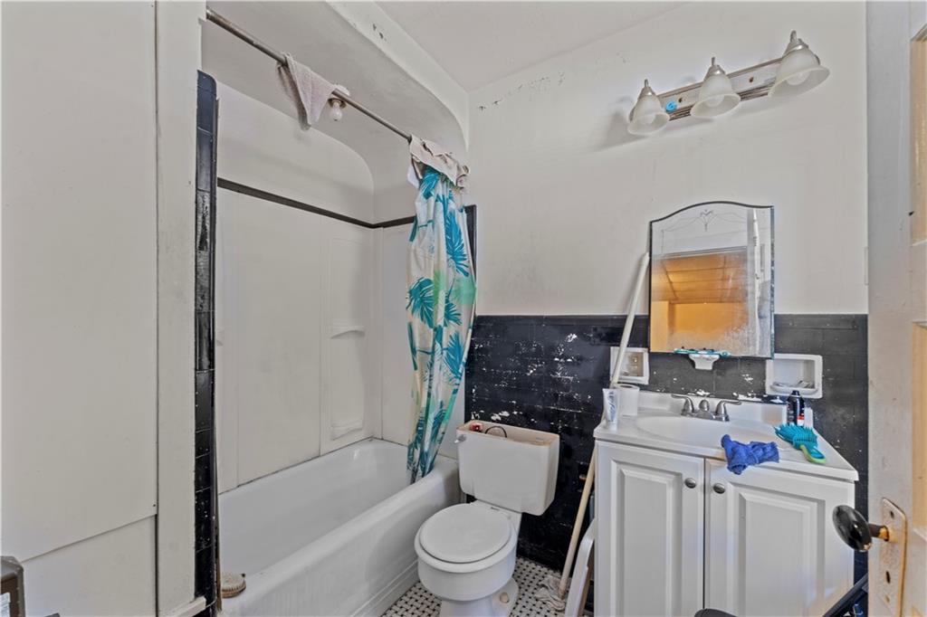 107 Ella Street McKees Rocks, PA 15136 - Photo 15 of 39 a bathroom with a sink toilet and shower