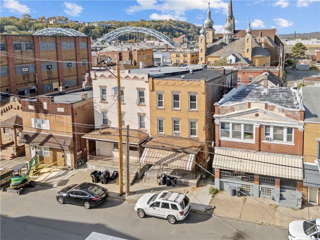 107 Ella Street McKees Rocks, PA 15136 - Photo 2 of 39 a car parked in front of a building