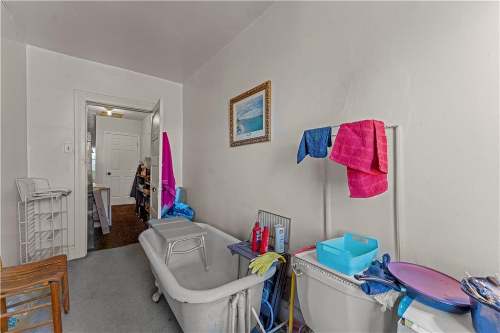 107 Ella Street McKees Rocks, PA 15136 - Photo 26 of 39 a living room with furniture and a wooden floor