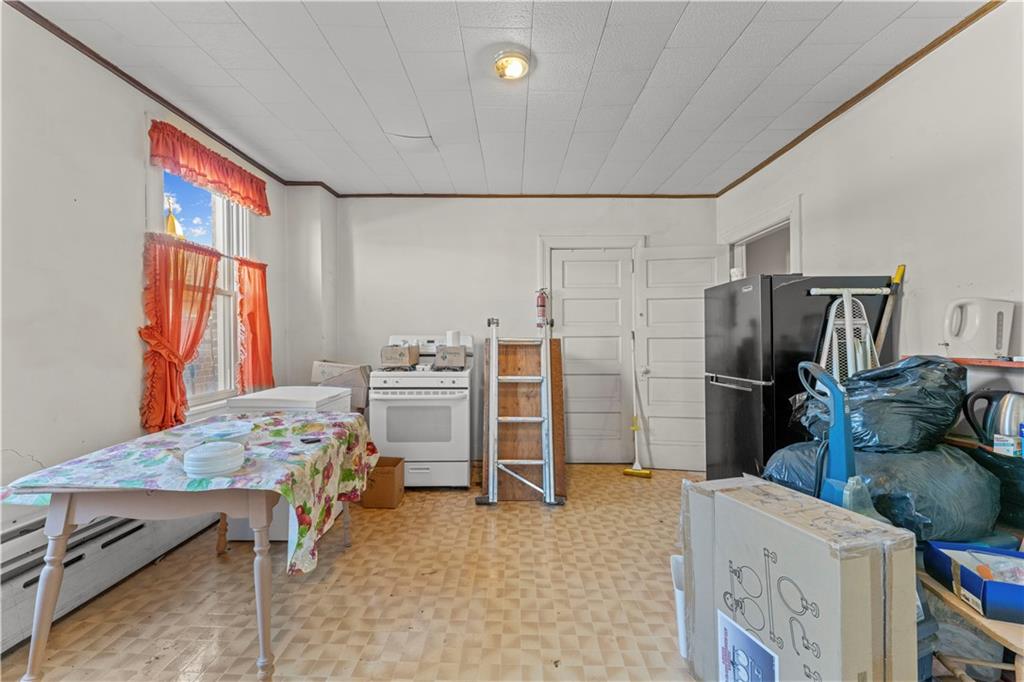107 Ella Street McKees Rocks, PA 15136 - Photo 28 of 39 a bedroom with furniture and a window
