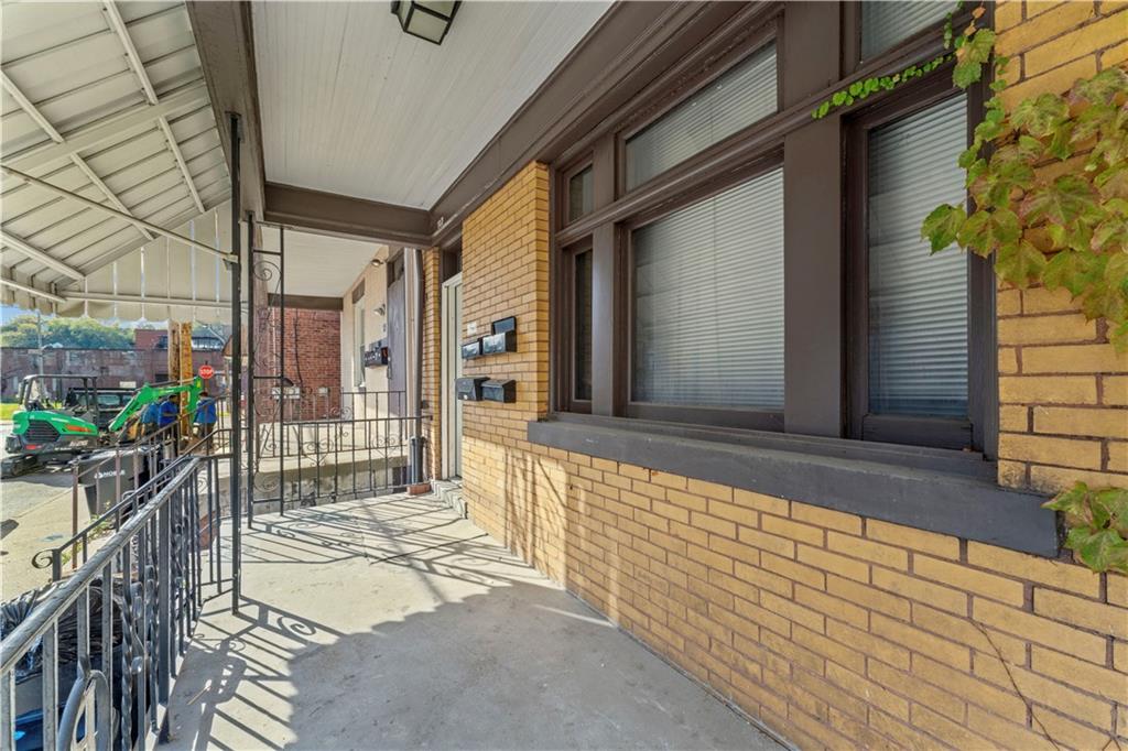 107 Ella Street McKees Rocks, PA 15136 - Photo 3 of 39 a view of a house with a patio