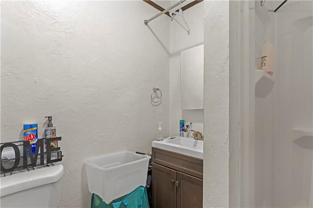 107 Ella Street McKees Rocks, PA 15136 - Photo 7 of 39 a bathroom with a sink vanity and tub