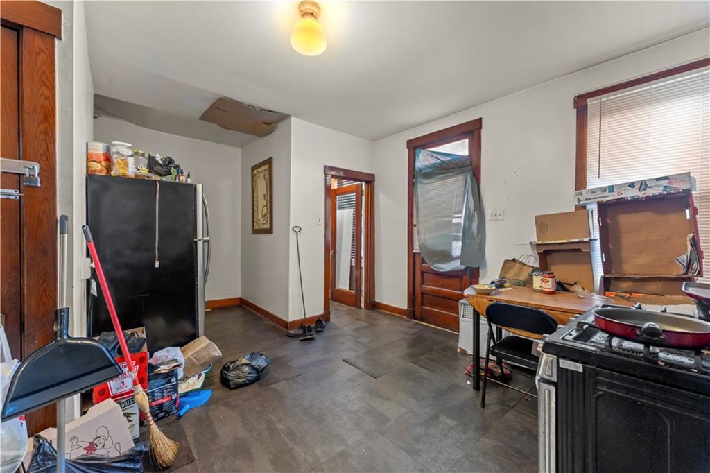 107 Ella Street McKees Rocks, PA 15136 - Photo 9 of 39 a view of a workspace with furniture and toys