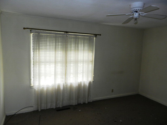3283 Millerfield Road Macon, GA 31211 - Photo 14 of 15 an empty room with a window