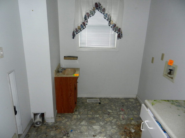 3283 Millerfield Road Macon, GA 31211 - Photo 10 of 15 a room with window and ample daylight