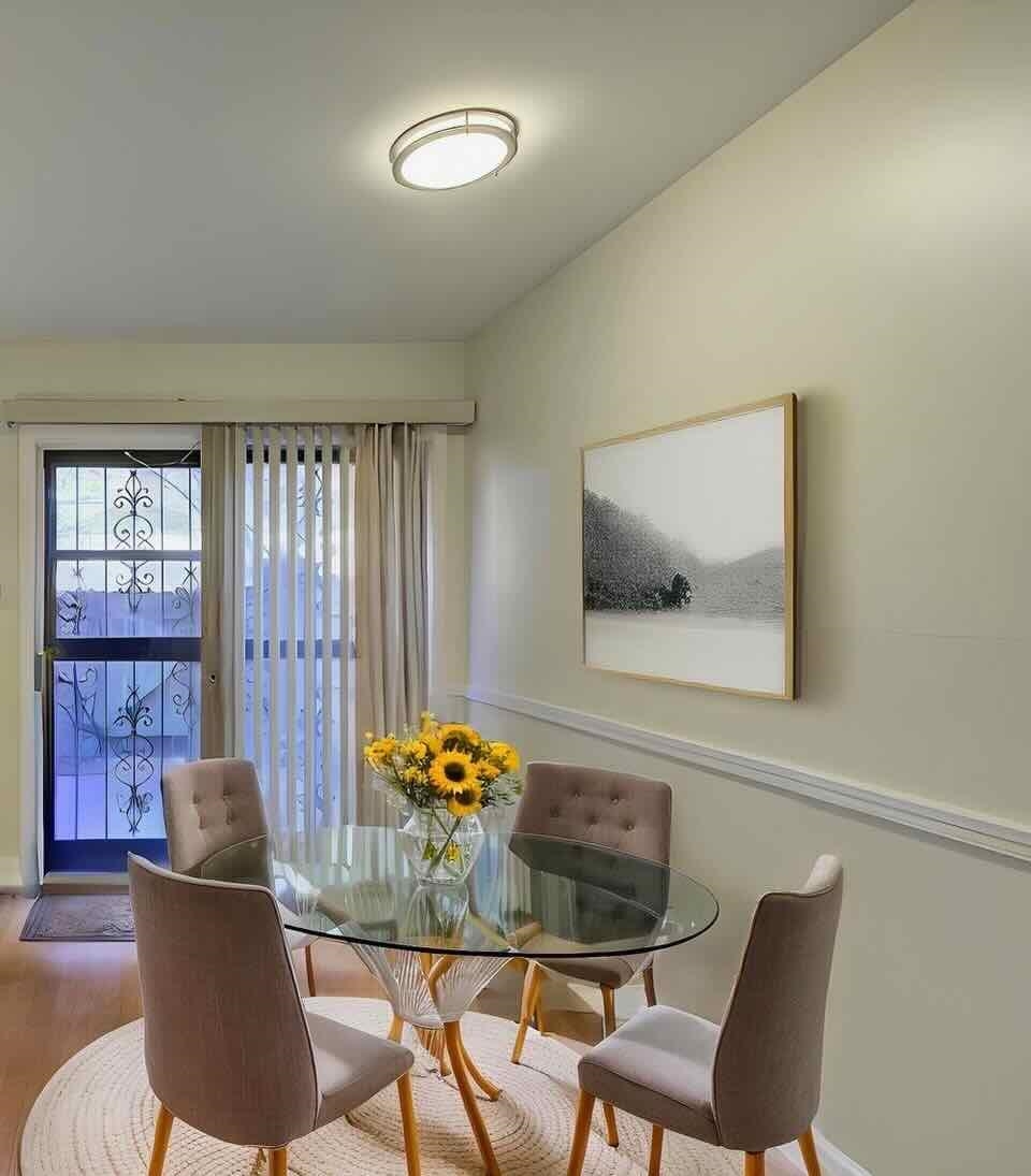 5718 Quince Road, Unit 10 Memphis, TN 38119 - Photo 8 of 28 Dining space featuring wood finished floors and baseboards