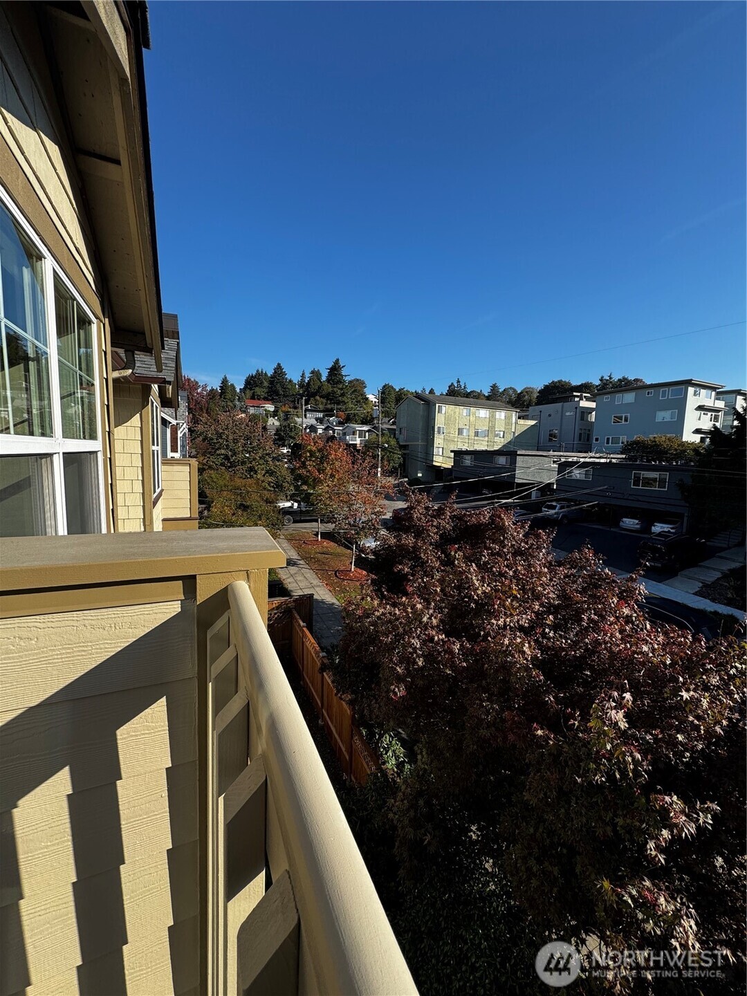 a view of a balcony with chairs