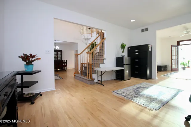 a view of a dining room with furniture and window