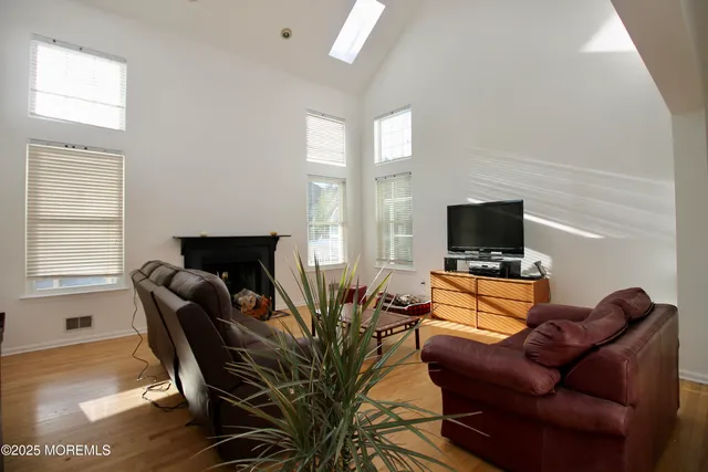 a kitchen with a refrigerator and cabinets