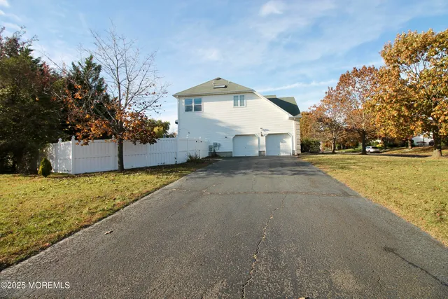 a view of swimming pool with a yard