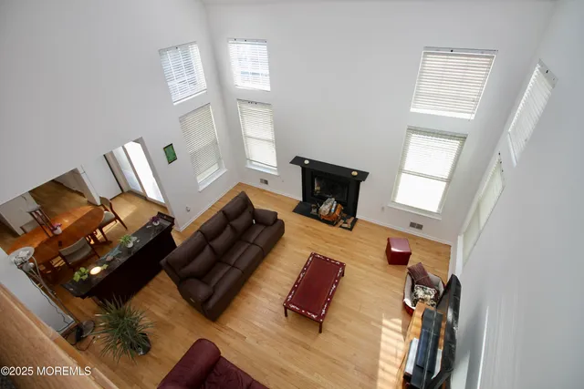 a balcony with table and chairs